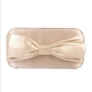 Gold Kate Spade clutch